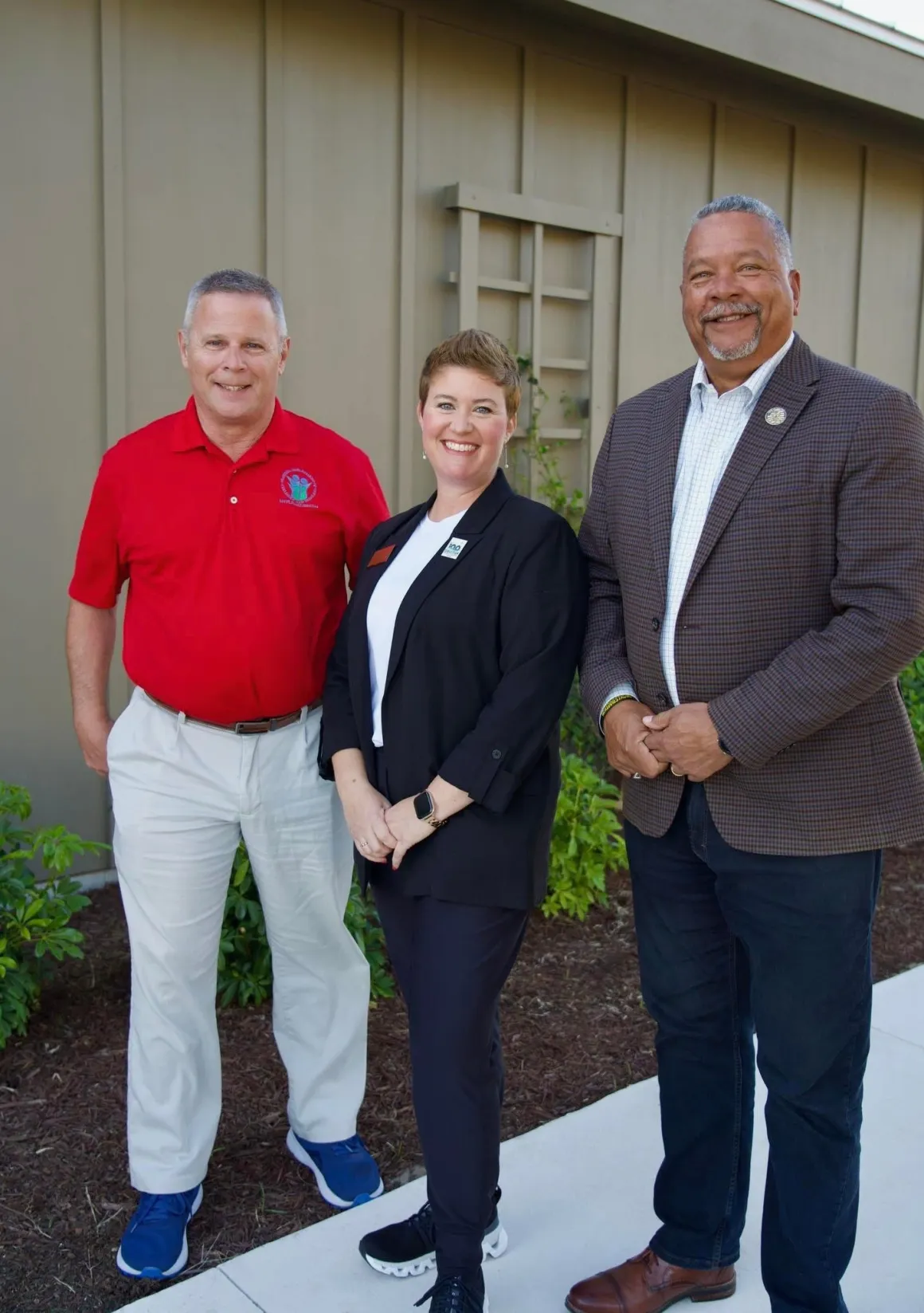 Bob McPartlan with community members at a local event
