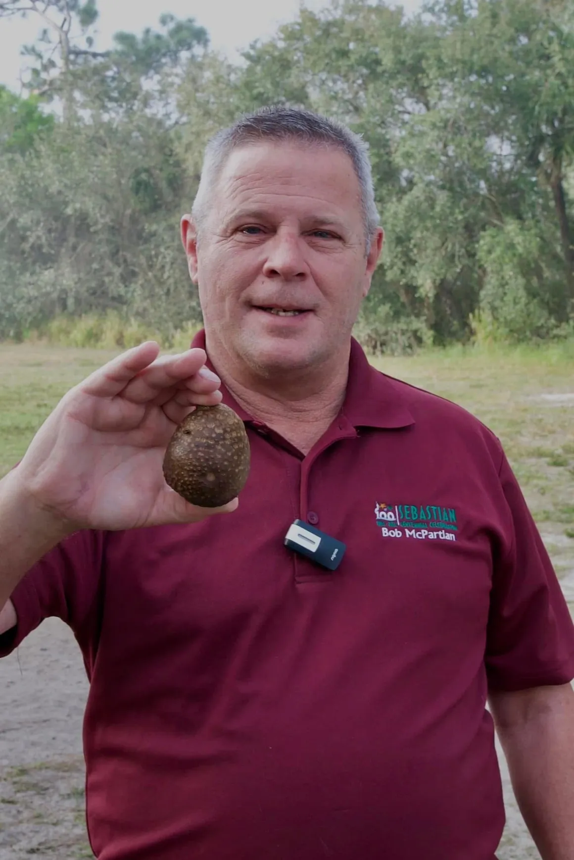 Bob McPartlan carefully holding a gopher tortoise egg